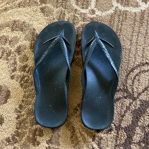 Archie’s flip flops